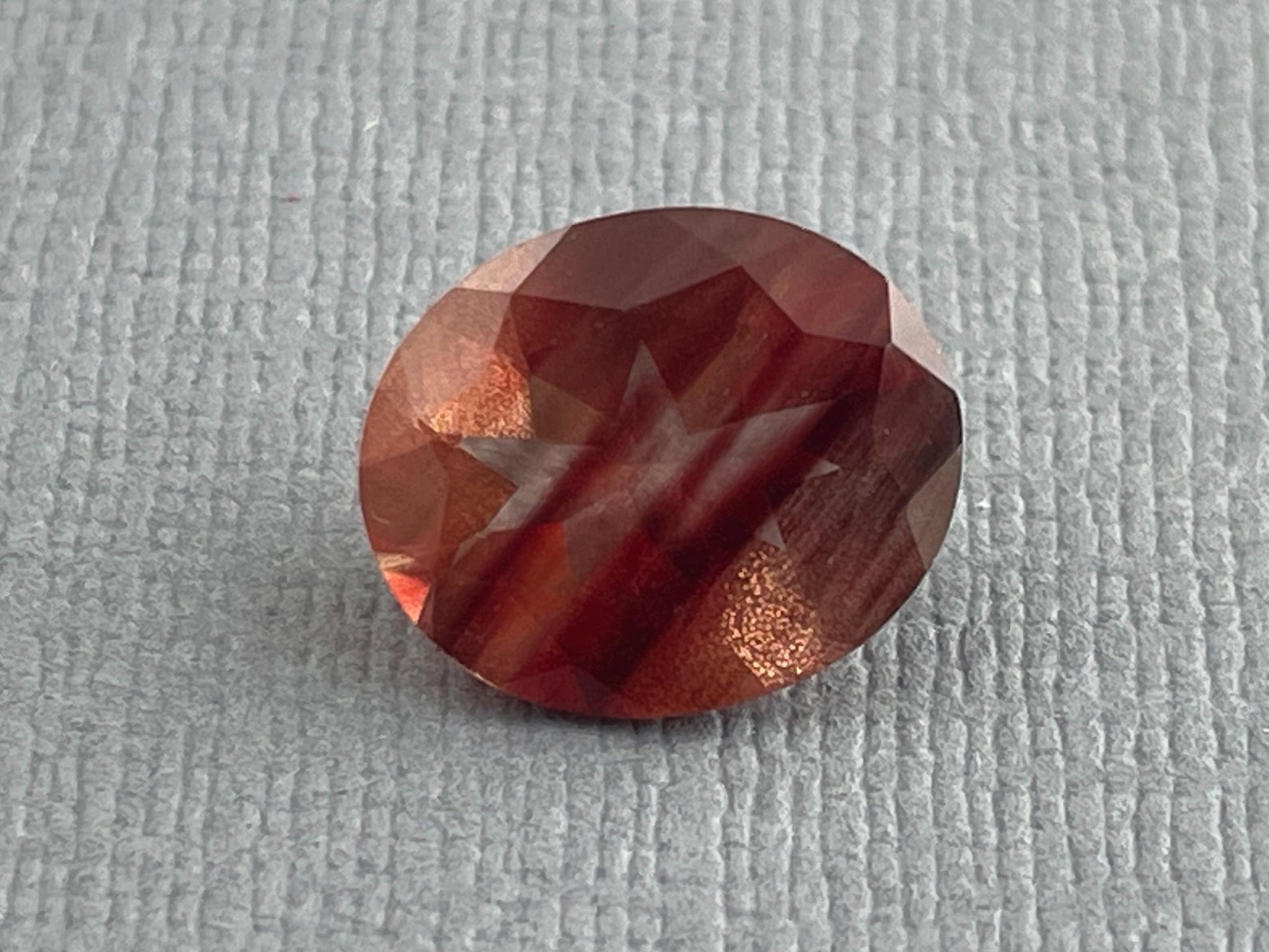 12x10 Red Oregon Sunstone Oval Faceted Gemstone with Schiller | 3.9 carats | OSF165 - Oregon Sunstone - Gem Enthusiast