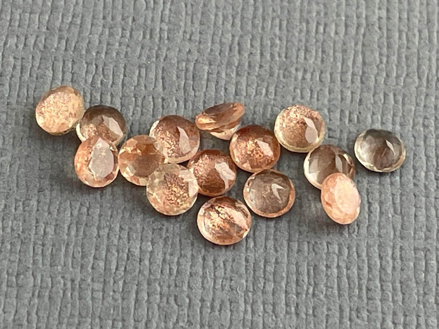 3.5 mm Oregon Sunstones Faceted Round Gemstones with Schiller - Gem Enthusiast