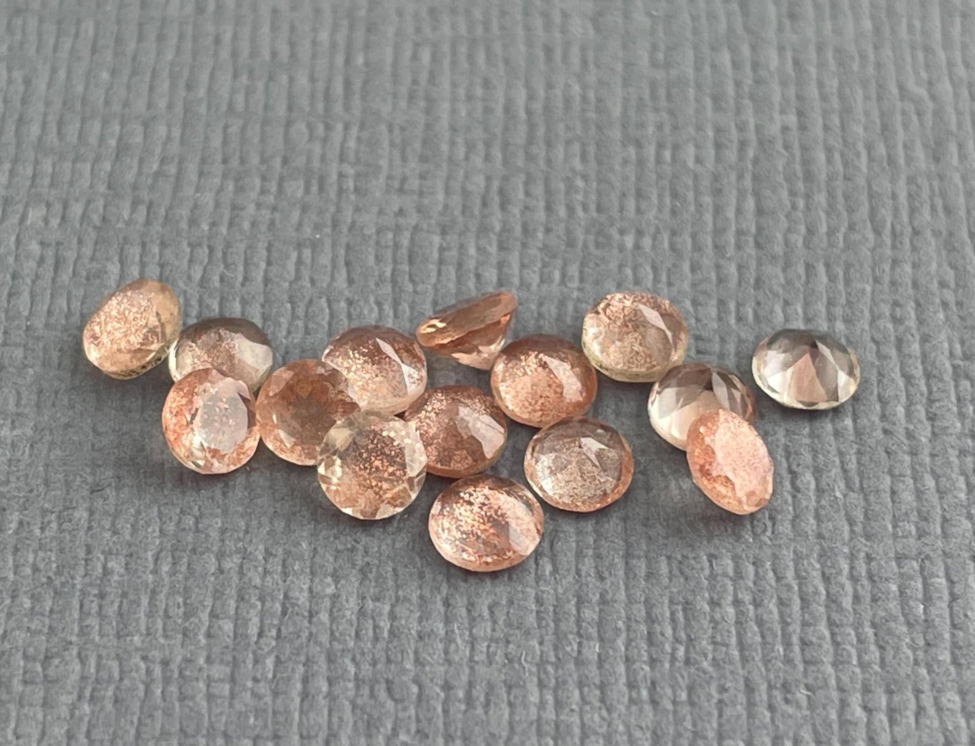 3.5 mm Oregon Sunstones Faceted Round Gemstones with Schiller - Gem Enthusiast