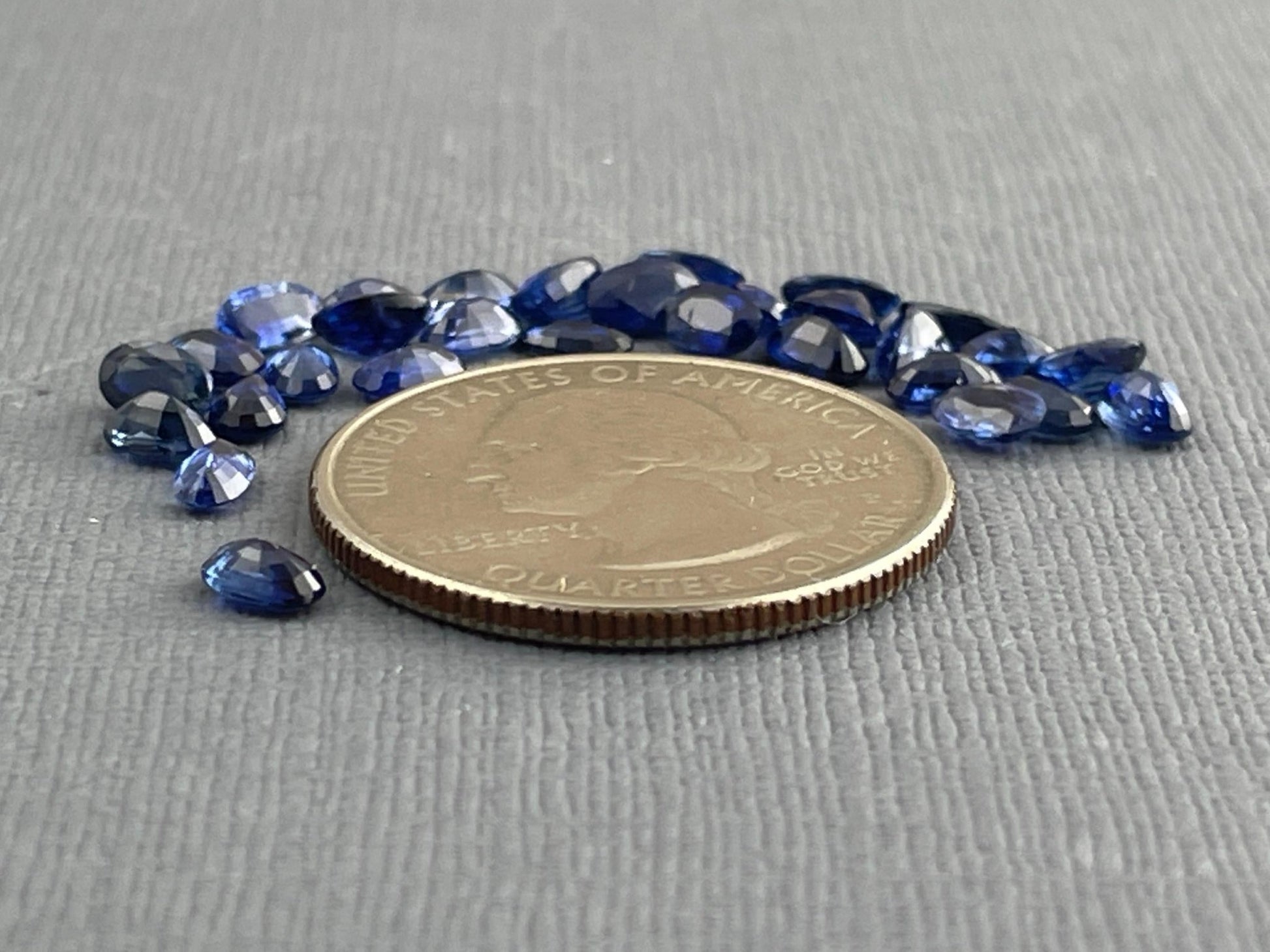 Blue Bicolor Sapphire Faceted Ovals | 5x3 mm | 4 Stones per Lot - Sapphire - Gem Enthusiast