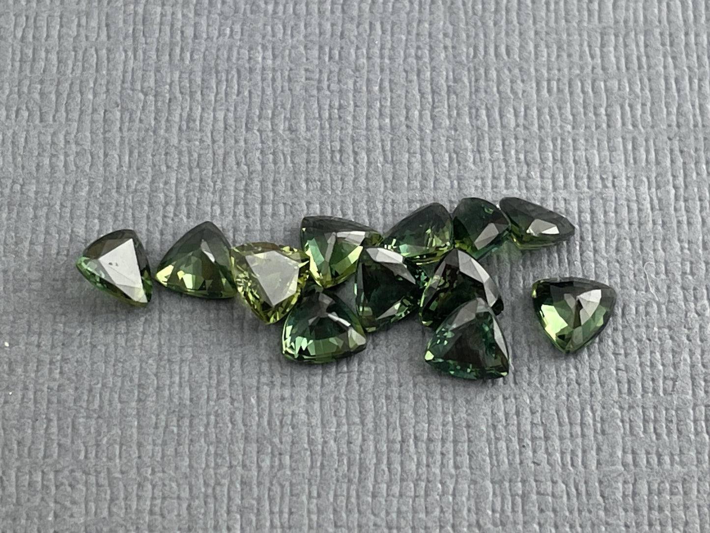 Green Sapphire Trillion Faceted Gemstone | 4.5 mm | Per Stone - Gem Enthusiast