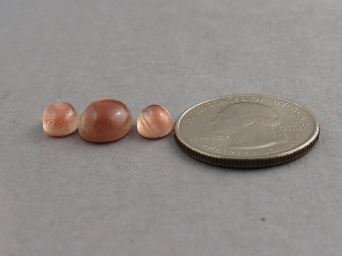 Oregon Sunstones Oval Cabochon Set | 8x6 pair and 11x9 single | 7 carats | OSC330 - Gem Enthusiast