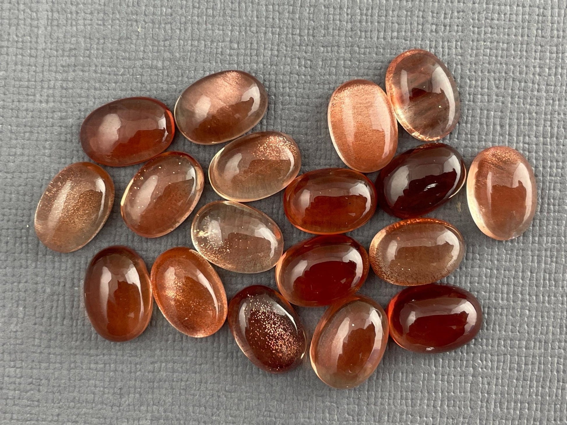 10x7 or 10x8 Oregon Sunstones Oval Cabochon with Schiller | Per Stone - Oregon Sunstone - Gem Enthusiast