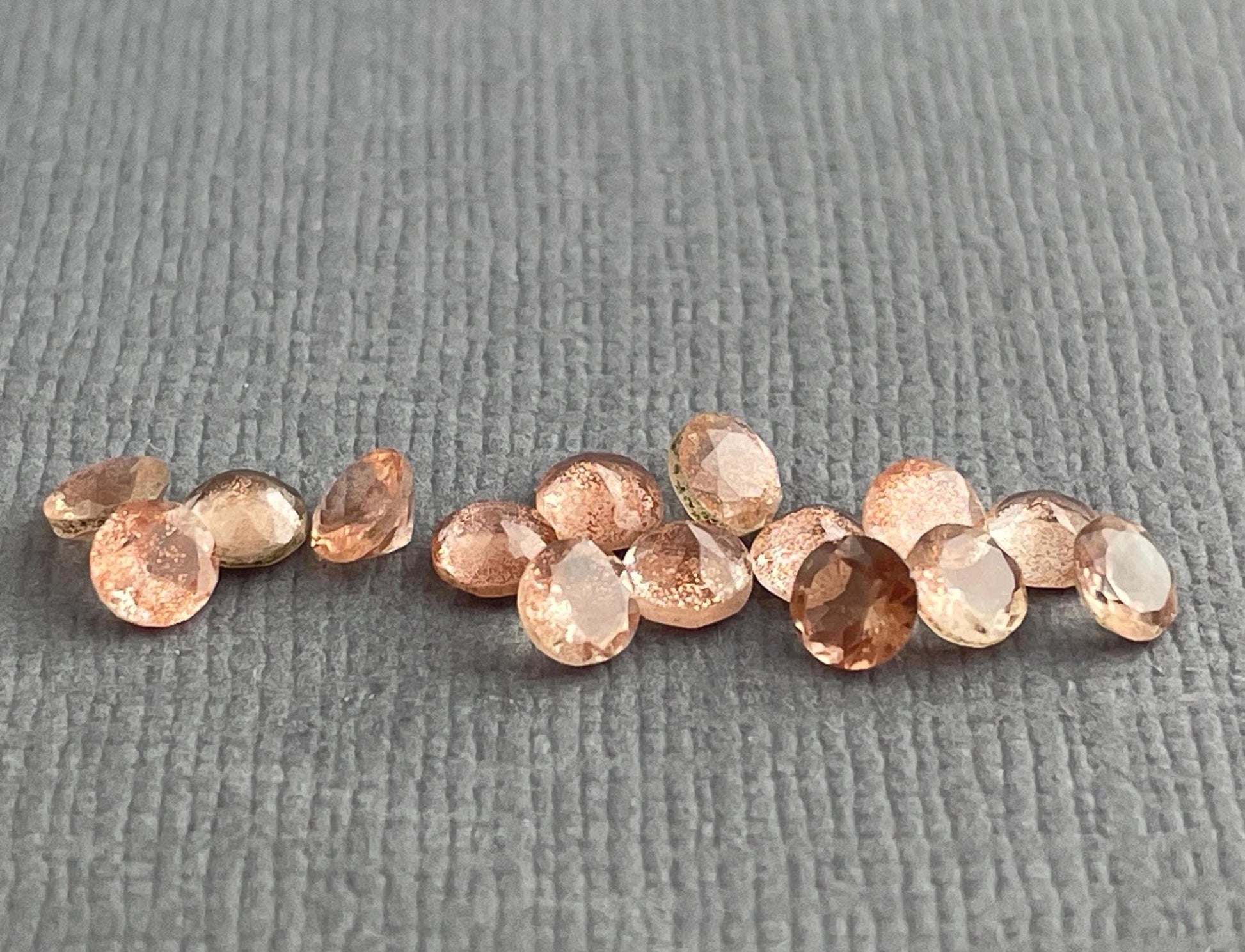 3.5 mm Oregon Sunstones Faceted Round Gemstones with Schiller - Gem Enthusiast