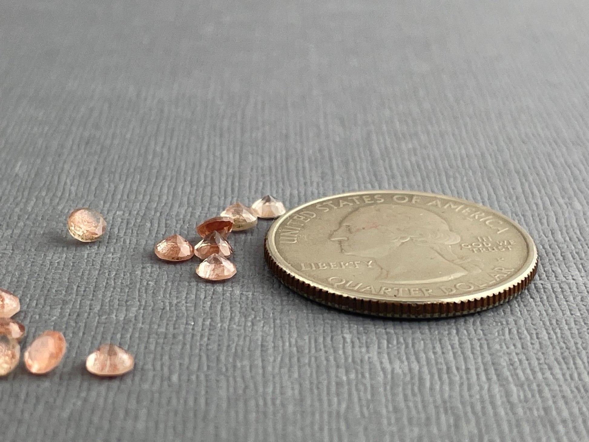 3.5 mm Oregon Sunstones Faceted Round Gemstones with Schiller - Gem Enthusiast