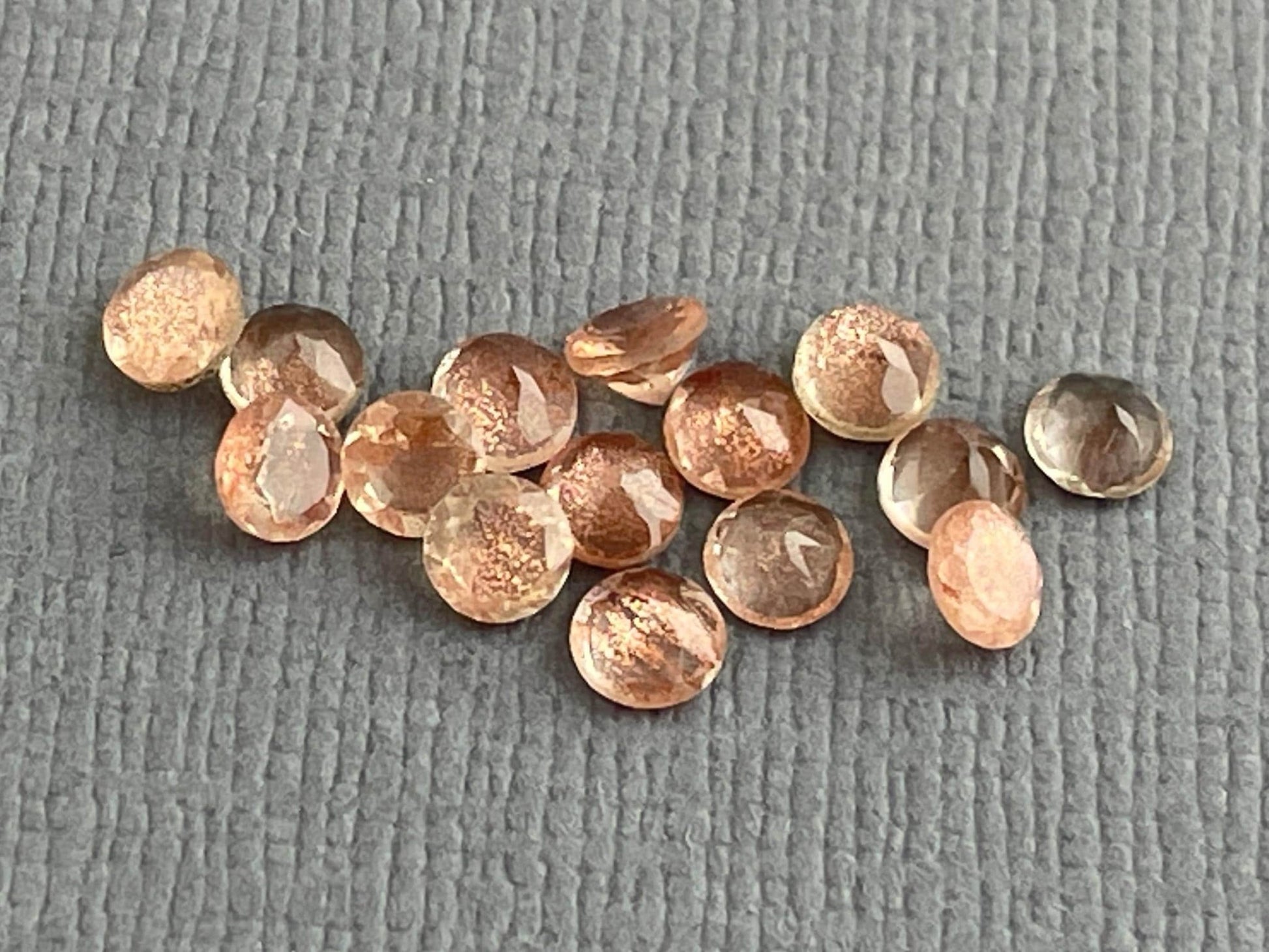 3.5 mm Oregon Sunstones Faceted Round Gemstones with Schiller - Gem Enthusiast