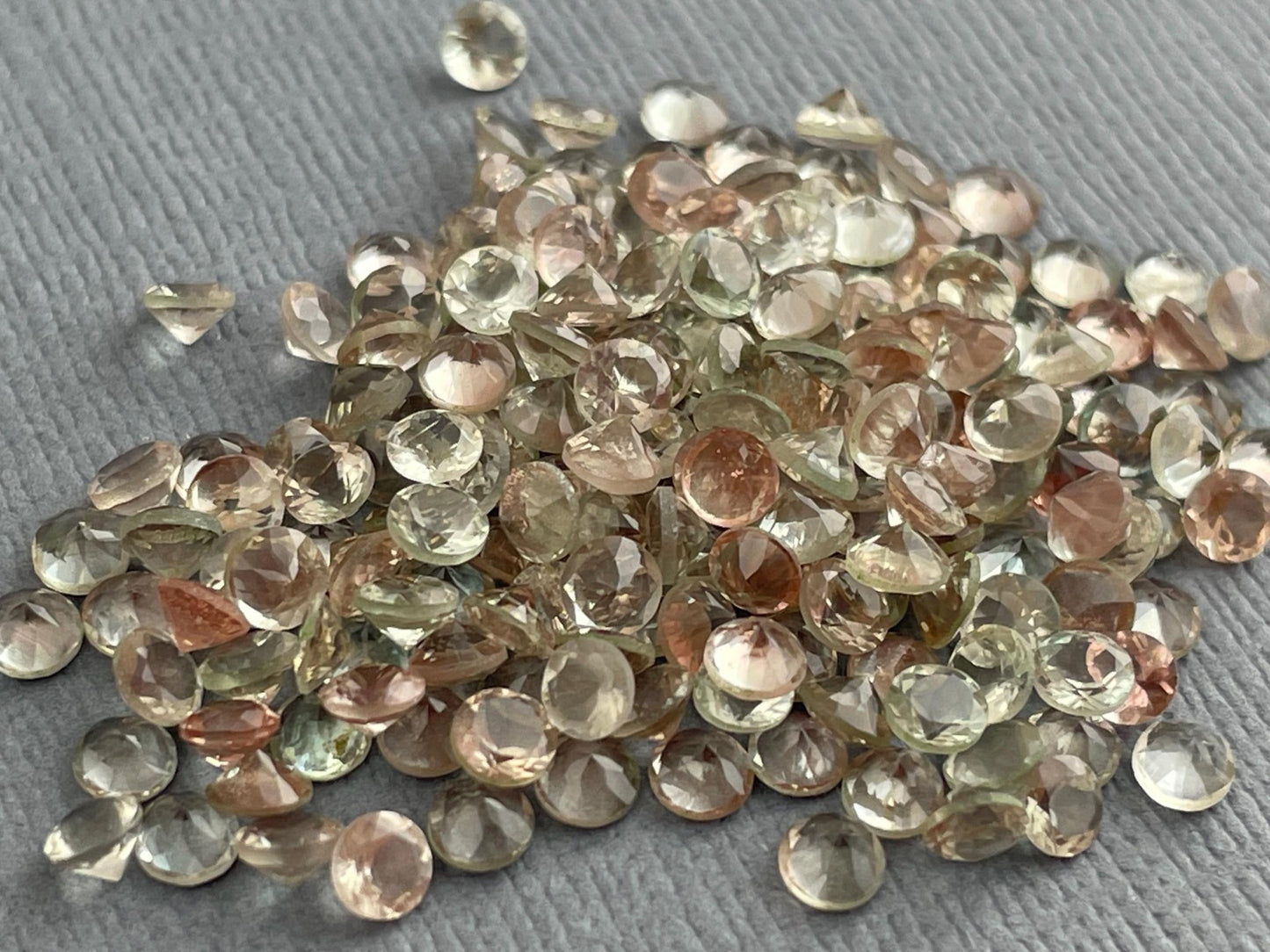 3mm Faceted Oregon Sunstones: Pale Peach/Green Round Gemstones, 5 or 10 Stone Lots - Gem Enthusiast