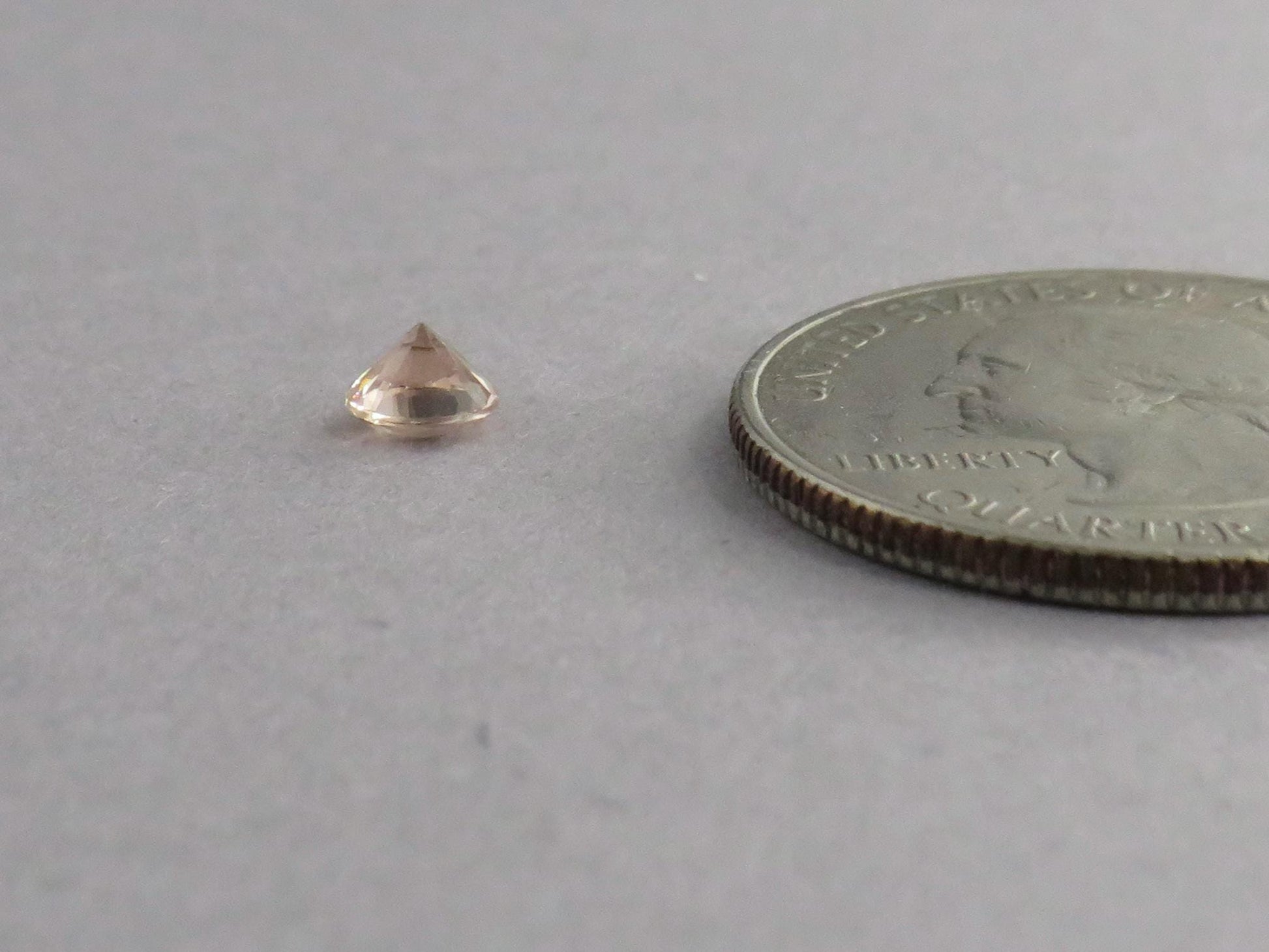 4.5mm Oregon Sunstone Faceted Round | Natural American Gemstone | 0.32ct | OSF242 - Gem Enthusiast
