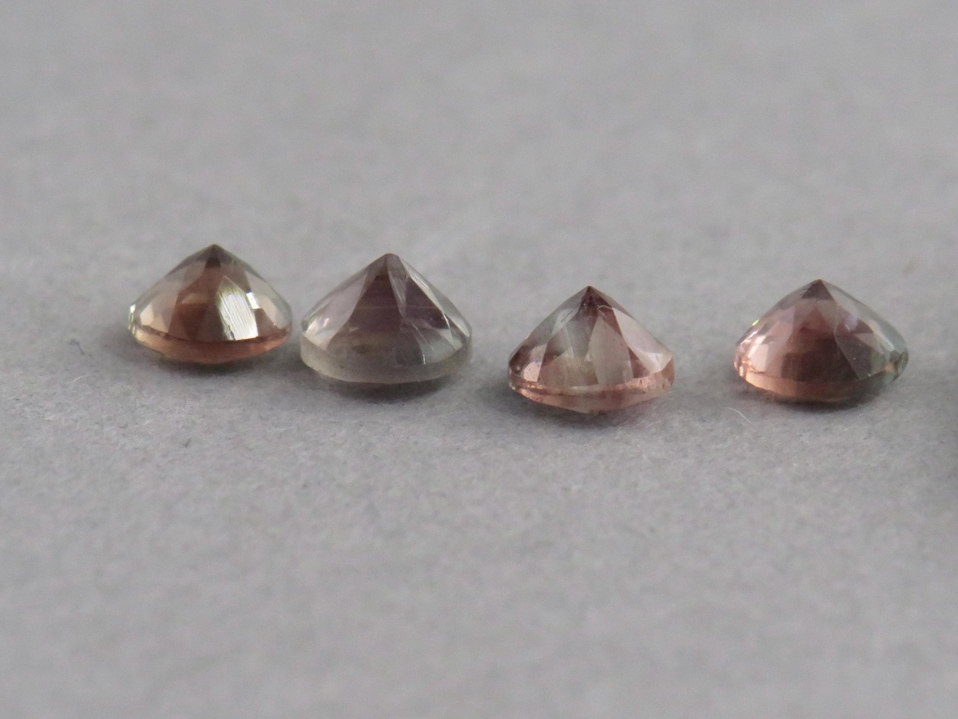 4mm Oregon Sunstone Lot | Red with Zoning and Striations | Faceted Round Gemstones | OSF247 - Gem Enthusiast