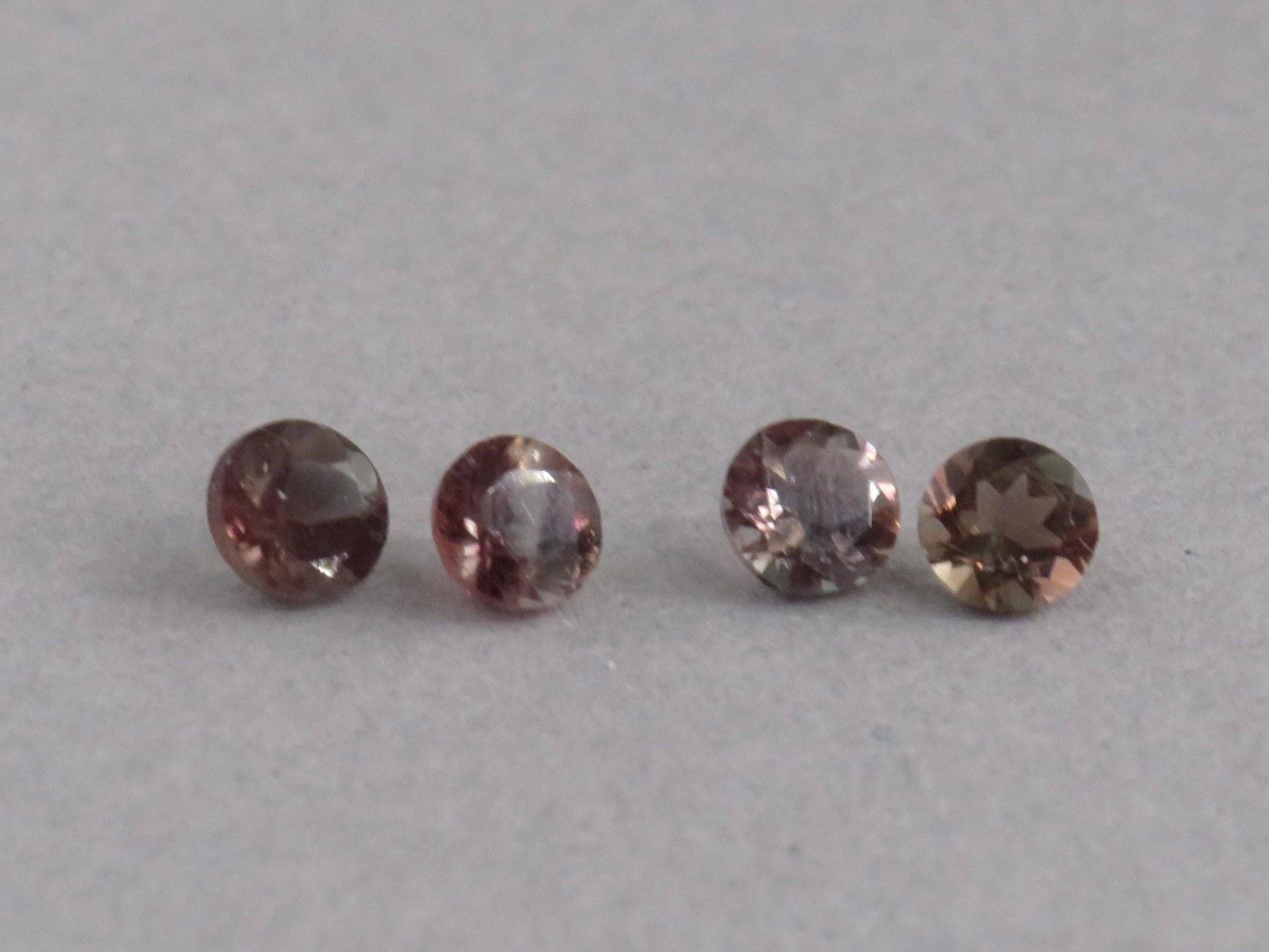 4mm Oregon Sunstone Lot | Red with Zoning and Striations | Faceted Round Gemstones | OSF247 - Gem Enthusiast