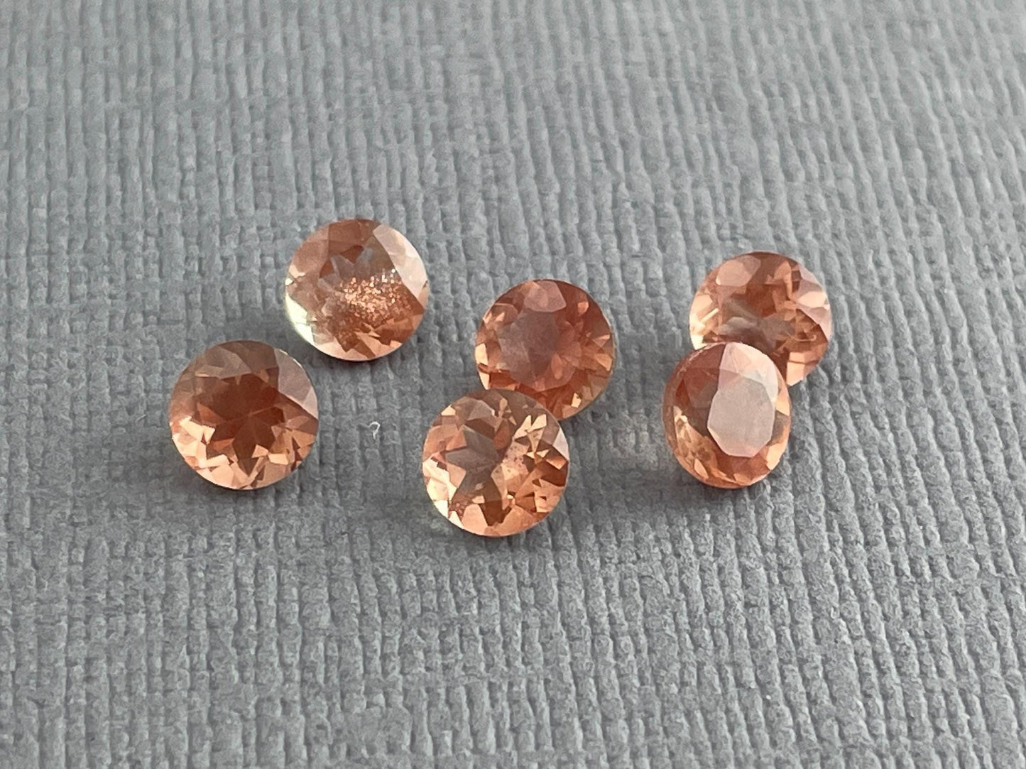 5mm Oregon Sunstones Faceted Round Gemstones | Medium, Light, Bi - color - Gem Enthusiast