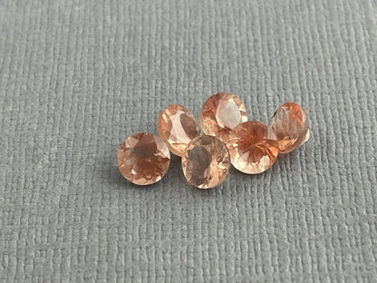 5mm Oregon Sunstones Faceted Round Gemstones | Medium, Light, Bi - color - Gem Enthusiast