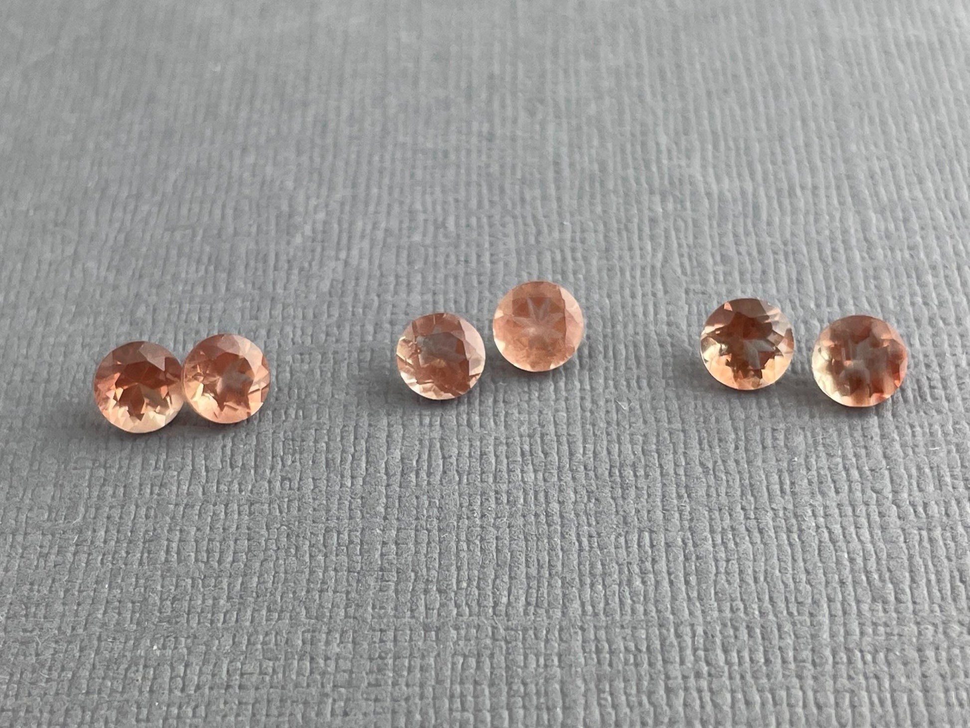 5mm Oregon Sunstones Faceted Round Gemstones | Medium, Light, Bi - color - Gem Enthusiast