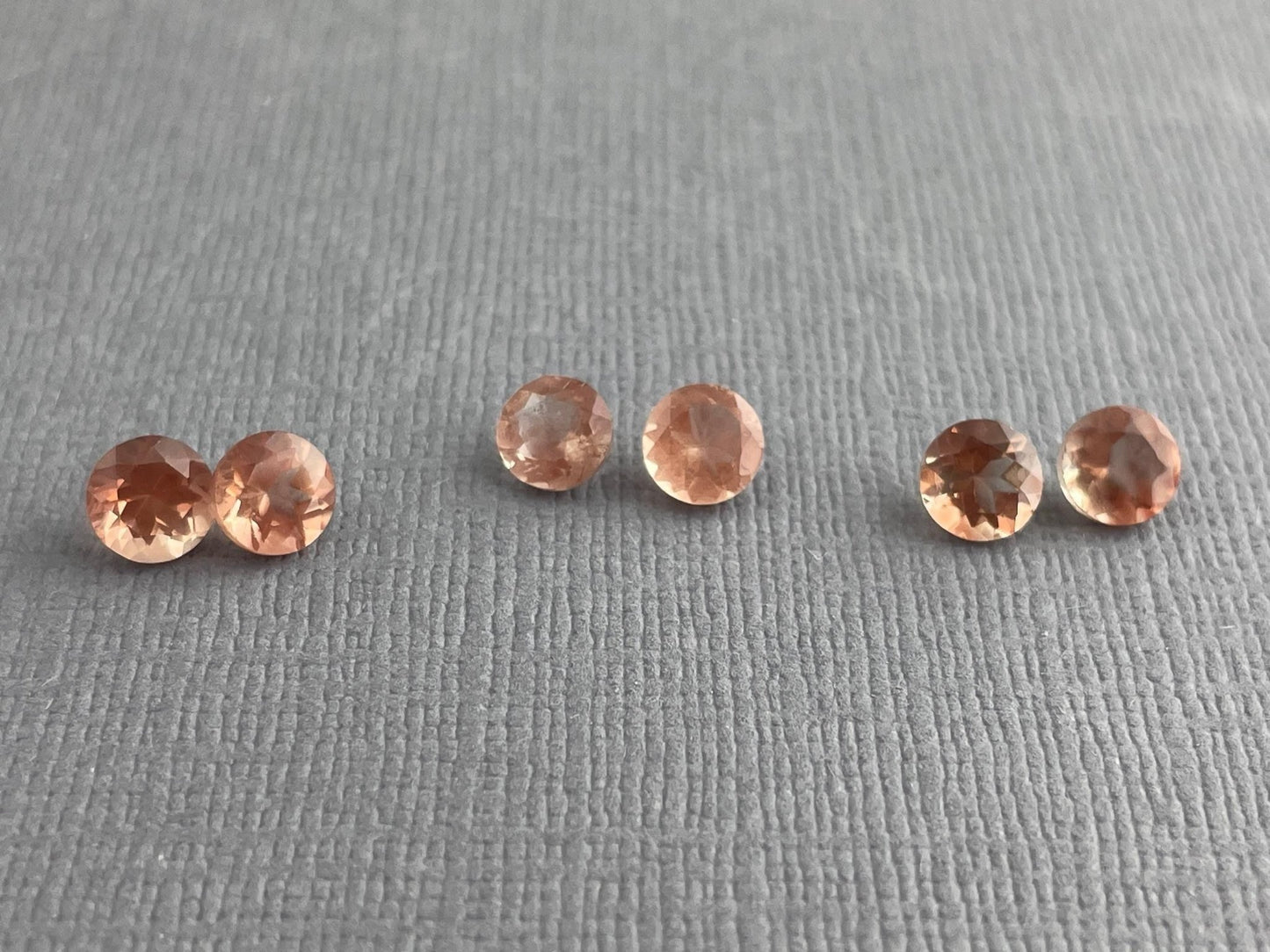 5mm Oregon Sunstones Faceted Round Gemstones | Medium, Light, Bi - color - Gem Enthusiast