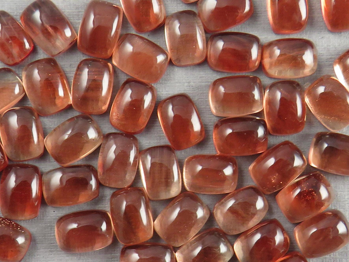 7.2 x 5.2 Oregon Sunstones Rectangle Cabochon in Red Color - Gem Enthusiast