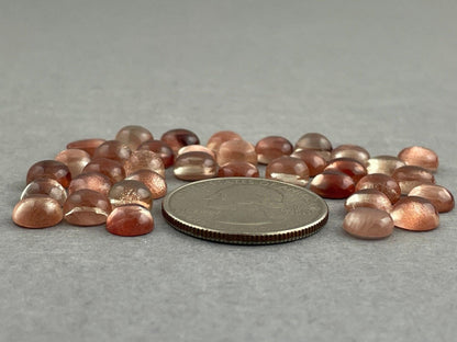 7mm Oregon Sunstones Round Cabochons | Medium, Light, or Champaign - Gem Enthusiast