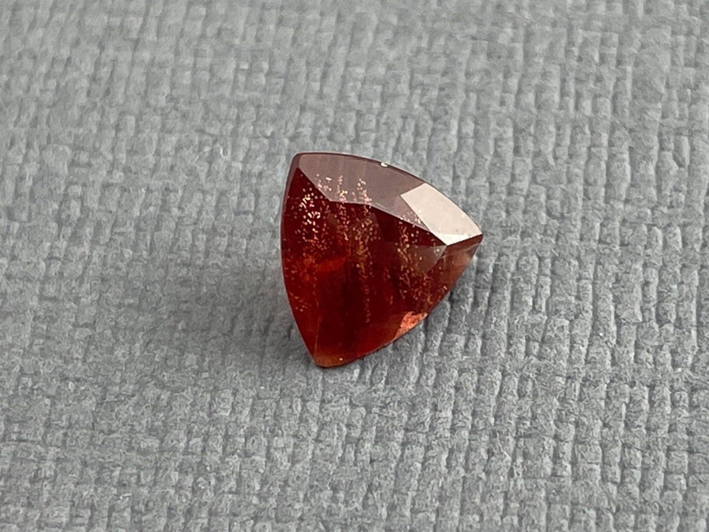 7mm Red Oregon Sunstone Trillion Gemstone with Schiller | .9 carats | OSF170 - Oregon Sunstone - Gem Enthusiast