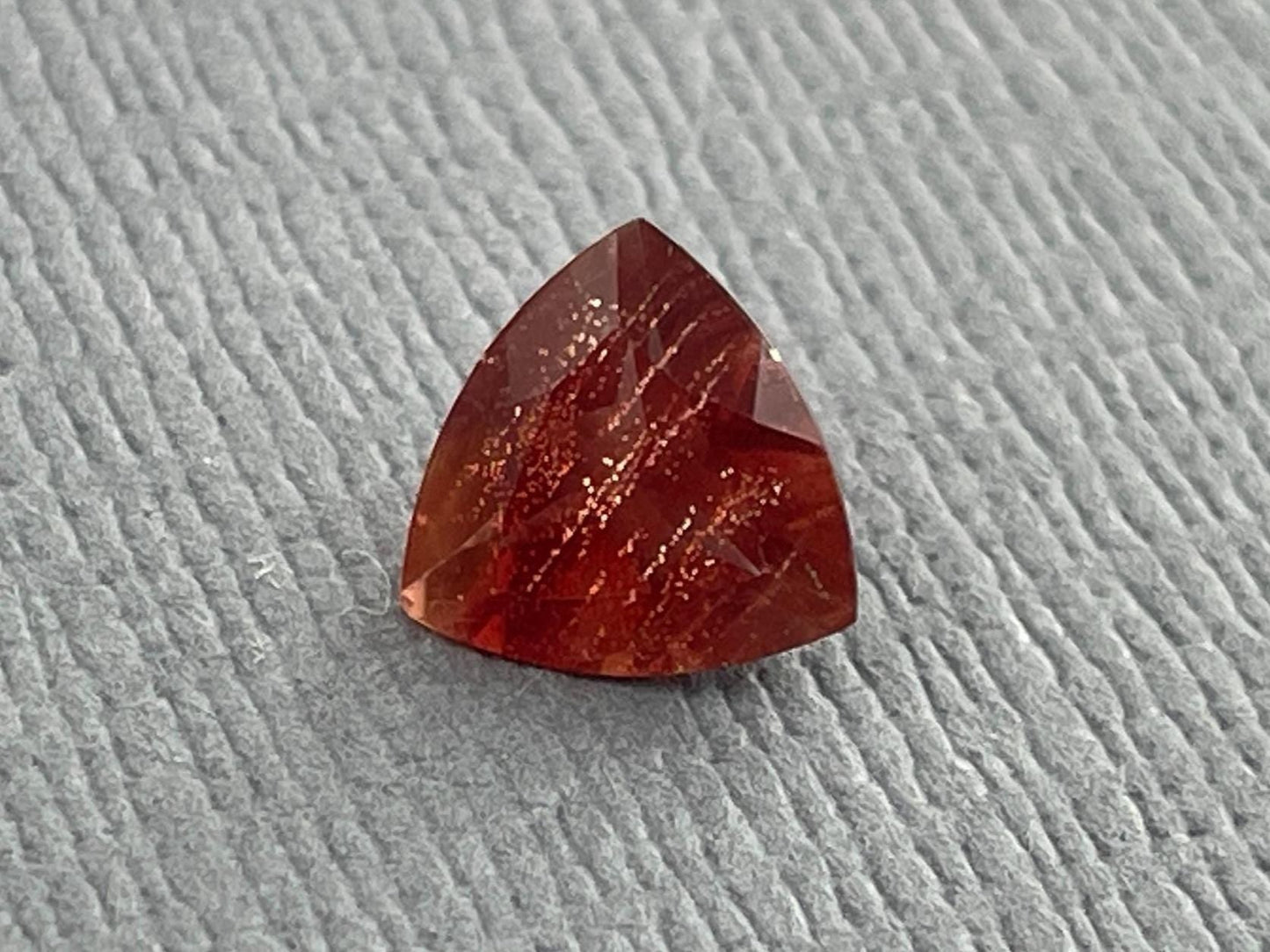 7mm Red Oregon Sunstone Trillion Gemstone with Schiller | .9 carats | OSF170 - Oregon Sunstone - Gem Enthusiast