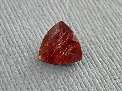 7mm Red Oregon Sunstone Trillion Gemstone with Schiller | .9 carats | OSF170 - Oregon Sunstone - Gem Enthusiast