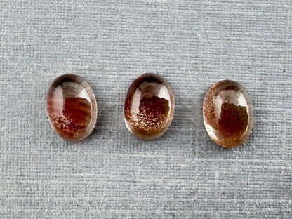 7x5 Schiller Oregon Sunstones Oval Cabochon Lot | Bi - Color | OSC312 - Gem Enthusiast