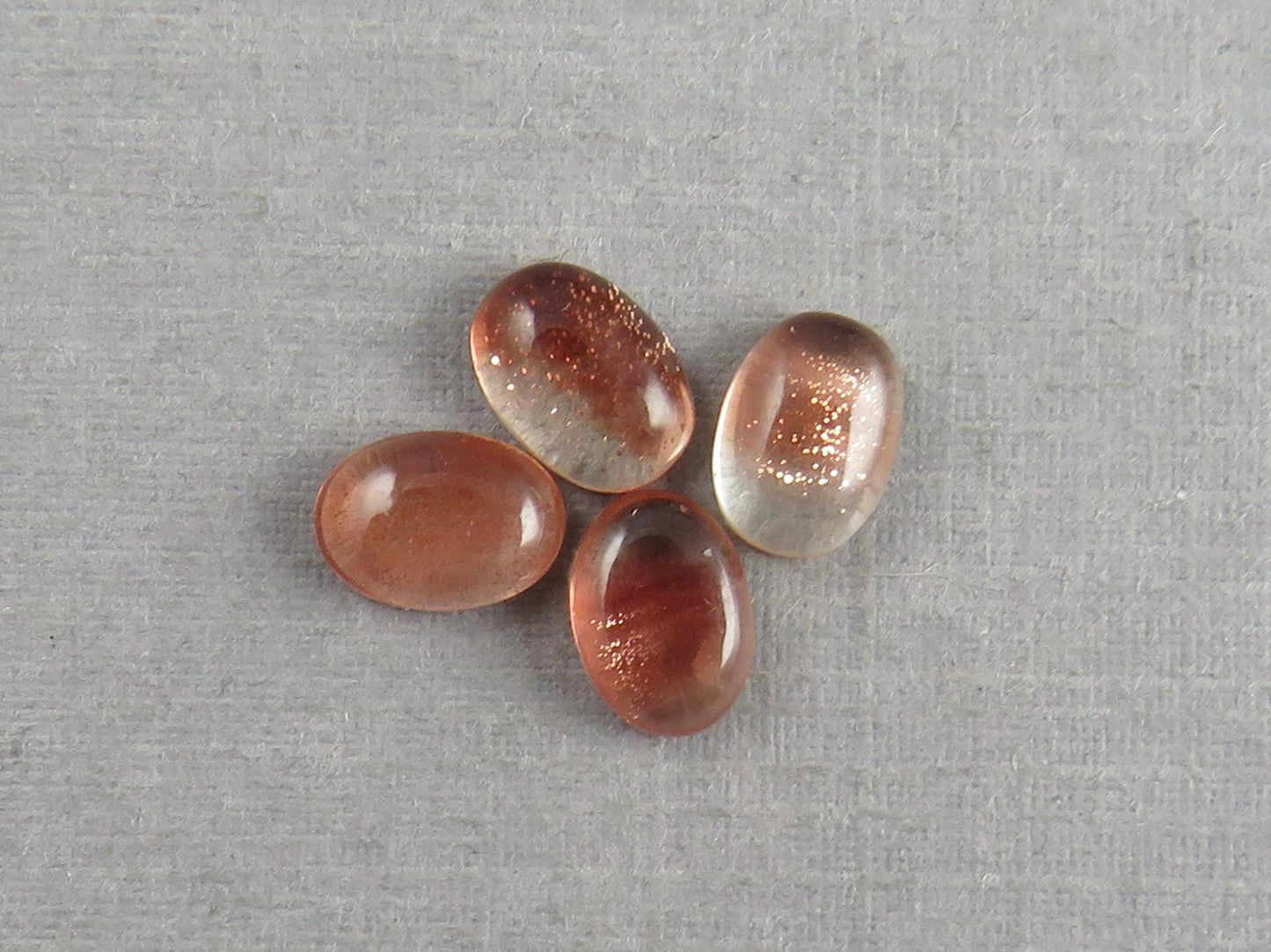 7x5 Schiller Oregon Sunstones Oval Cabochon Lot | Schiller and Color Zoning | OSC340 - Gem Enthusiast