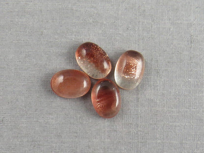 7x5 Schiller Oregon Sunstones Oval Cabochon Lot | Schiller and Color Zoning | OSC340 - Gem Enthusiast