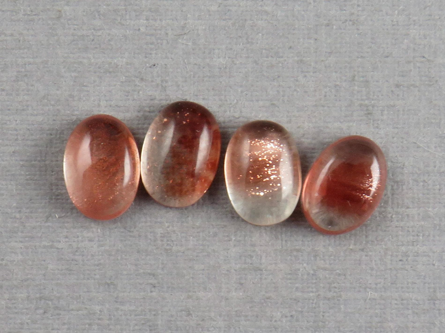 7x5 Schiller Oregon Sunstones Oval Cabochon Lot | Schiller and Color Zoning | OSC340 - Gem Enthusiast
