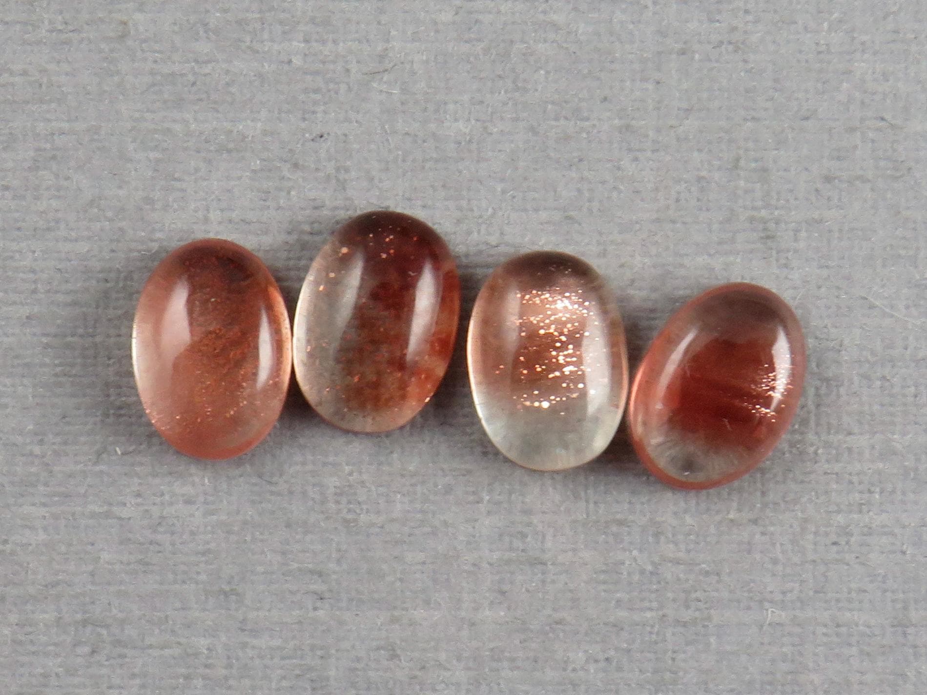 7x5 Schiller Oregon Sunstones Oval Cabochon Lot | Schiller and Color Zoning | OSC340 - Gem Enthusiast