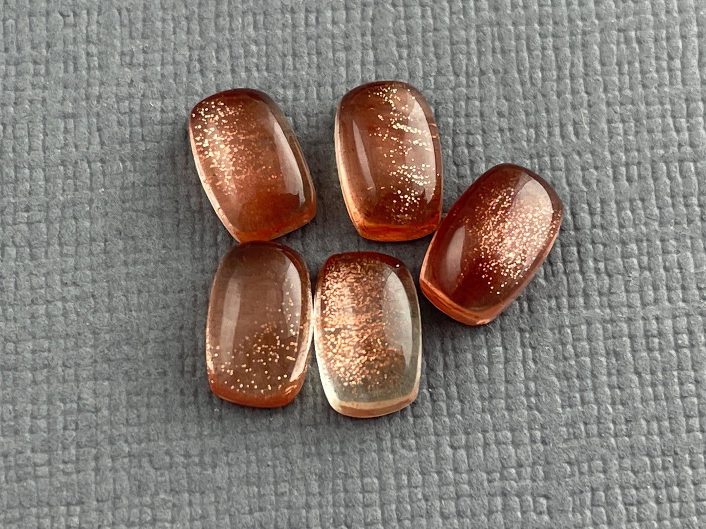 8x5 Oregon Sunstones Cushioned Cabochon with Schiller - Gem Enthusiast