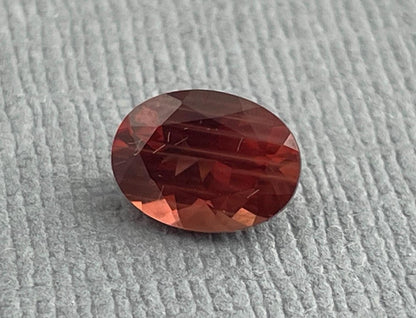 8x6 Red Oregon Sunstone Oval Faceted Gemstone | 1.12 carats | OSF180 - Oregon Sunstone - Gem Enthusiast