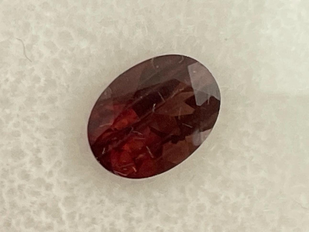 8x6 Red Oregon Sunstone Oval Faceted Gemstone | 1.12 carats | OSF180 - Oregon Sunstone - Gem Enthusiast