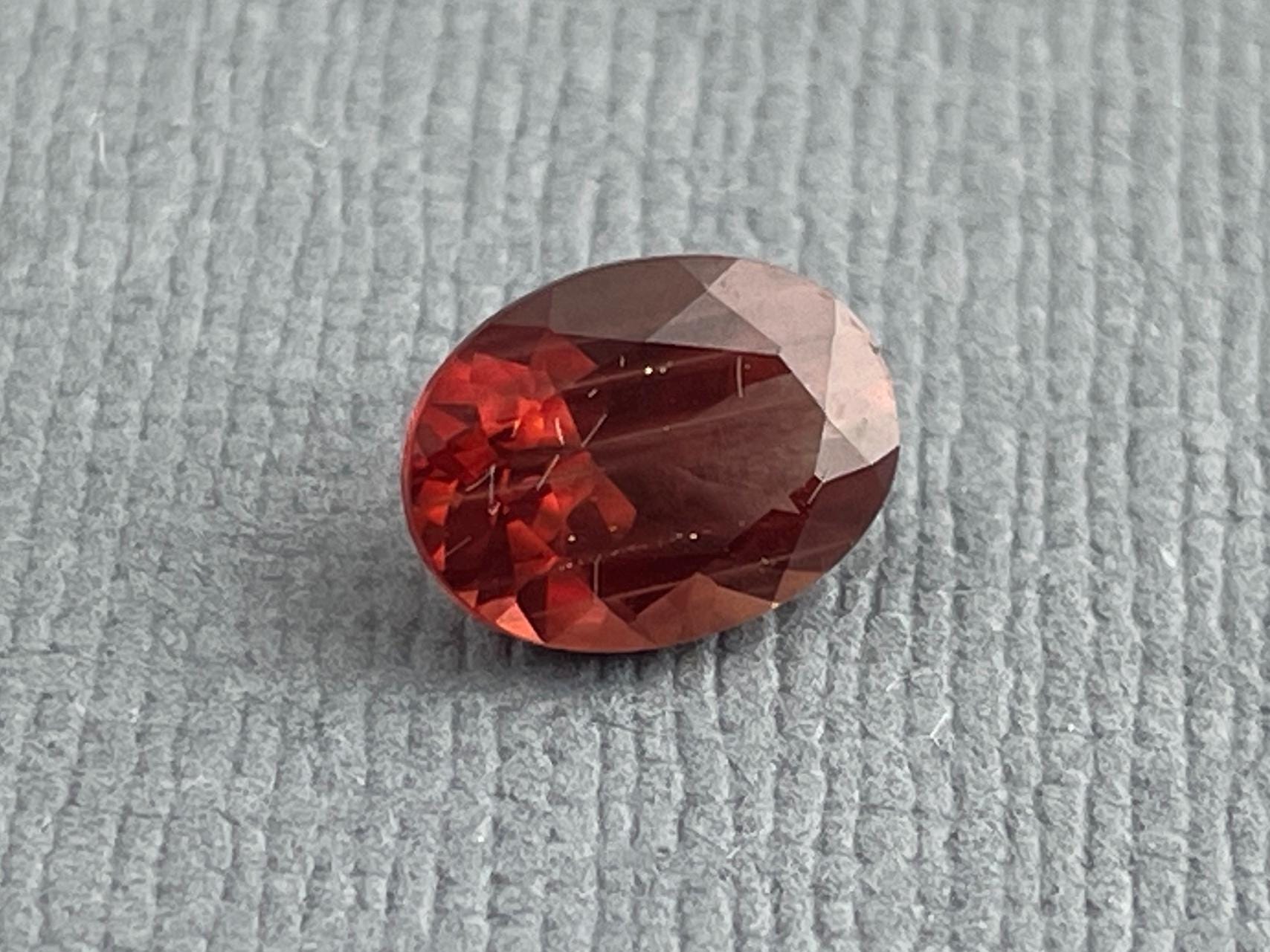 8x6 Red Oregon Sunstone Oval Faceted Gemstone | 1.12 carats | OSF180 - Oregon Sunstone - Gem Enthusiast