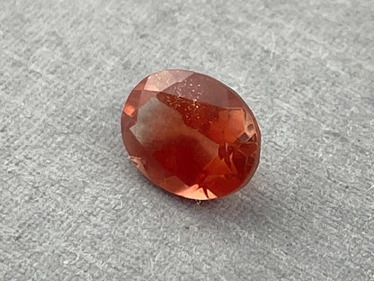 8x6 Red Oregon Sunstone Oval Faceted Gemstone | 1.23 carats | OSF213 - Oregon Sunstone - Gem Enthusiast