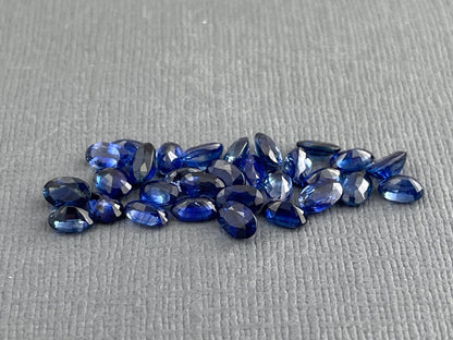 Blue Bicolor Sapphire Faceted Ovals | 5x3 mm | 4 Stones per Lot - Sapphire - Gem Enthusiast