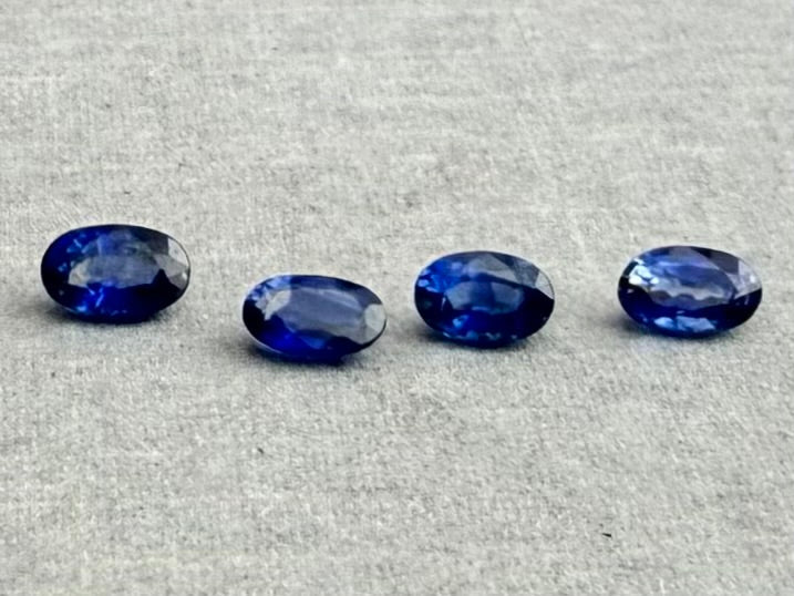 Blue Bicolor Sapphire Faceted Ovals | 5x3 mm | 4 Stones per Lot - Sapphire - Gem Enthusiast