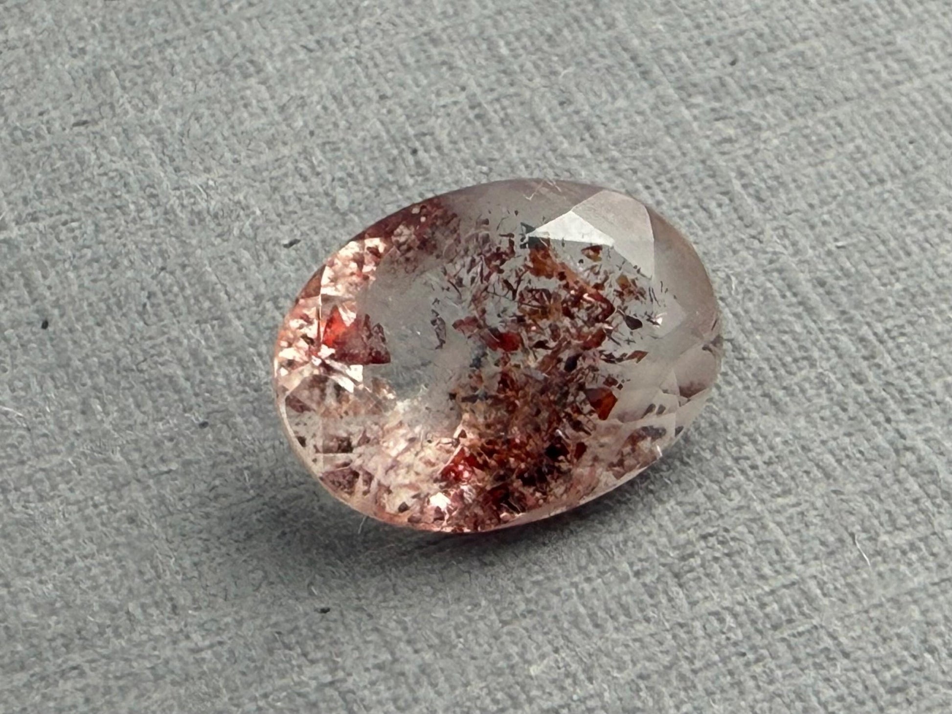 Fire Quartz with Hematite Flakes | 11x8mm | Oval Faceted Gemstone | QU533 - Gem Enthusiast