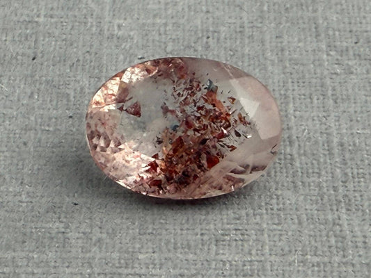 Fire Quartz with Hematite Flakes | 11x8mm | Oval Faceted Gemstone | QU533 - Gem Enthusiast