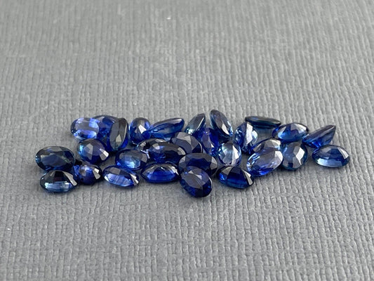 Blue Bicolor Sapphire Faceted Ovals | 5x3 mm | 4 Stones per Lot - Blue Sapphire - GemEnthusiast