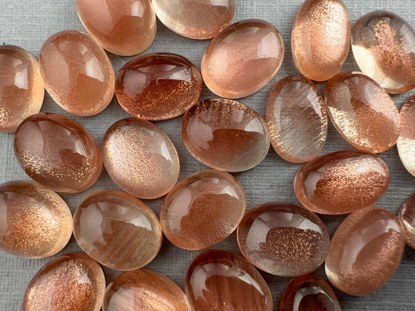 Oregon Sunstones | 10x7 9x6 8x5 | Oval Cabochon with Schiller | USA Gemstone - Oregon Sunstone - GemEnthusiast