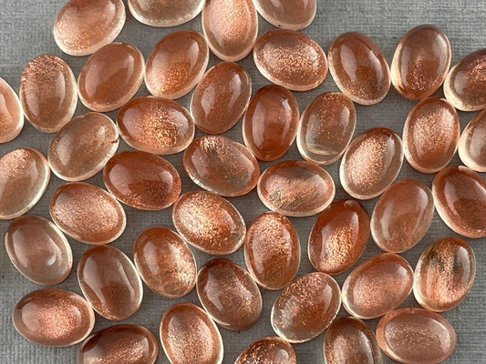 8x6 7x5 6x4 Oregon Sunstones Oval Cabochons with Schiller | Per Stone - Oregon Sunstone - GemEnthusiast
