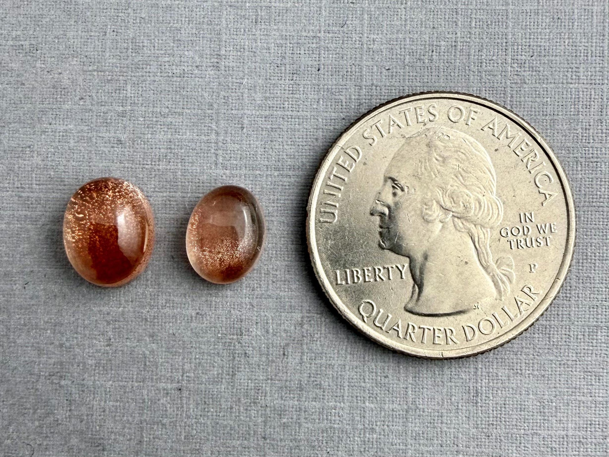 10x8 or 9x7 Oregon Sunstones Oval Cabochon with Schiller | Per Stone - Oregon Sunstone - GemEnthusiast