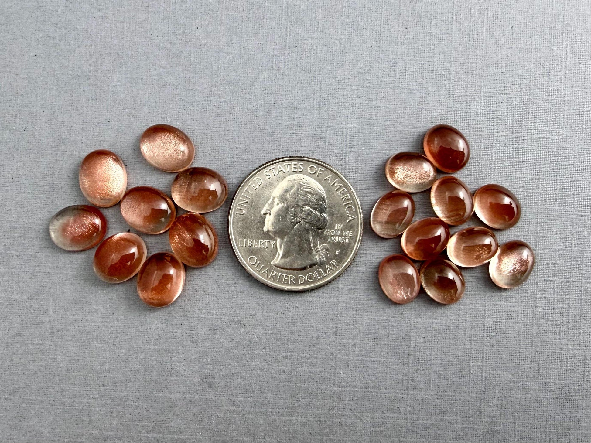 10x8 or 9x7 Oregon Sunstones Oval Cabochon with Schiller | Per Stone - Oregon Sunstone - GemEnthusiast