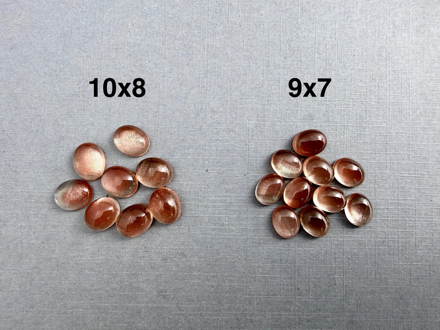 10x8 or 9x7 Oregon Sunstones Oval Cabochon with Schiller | Per Stone - Oregon Sunstone - GemEnthusiast