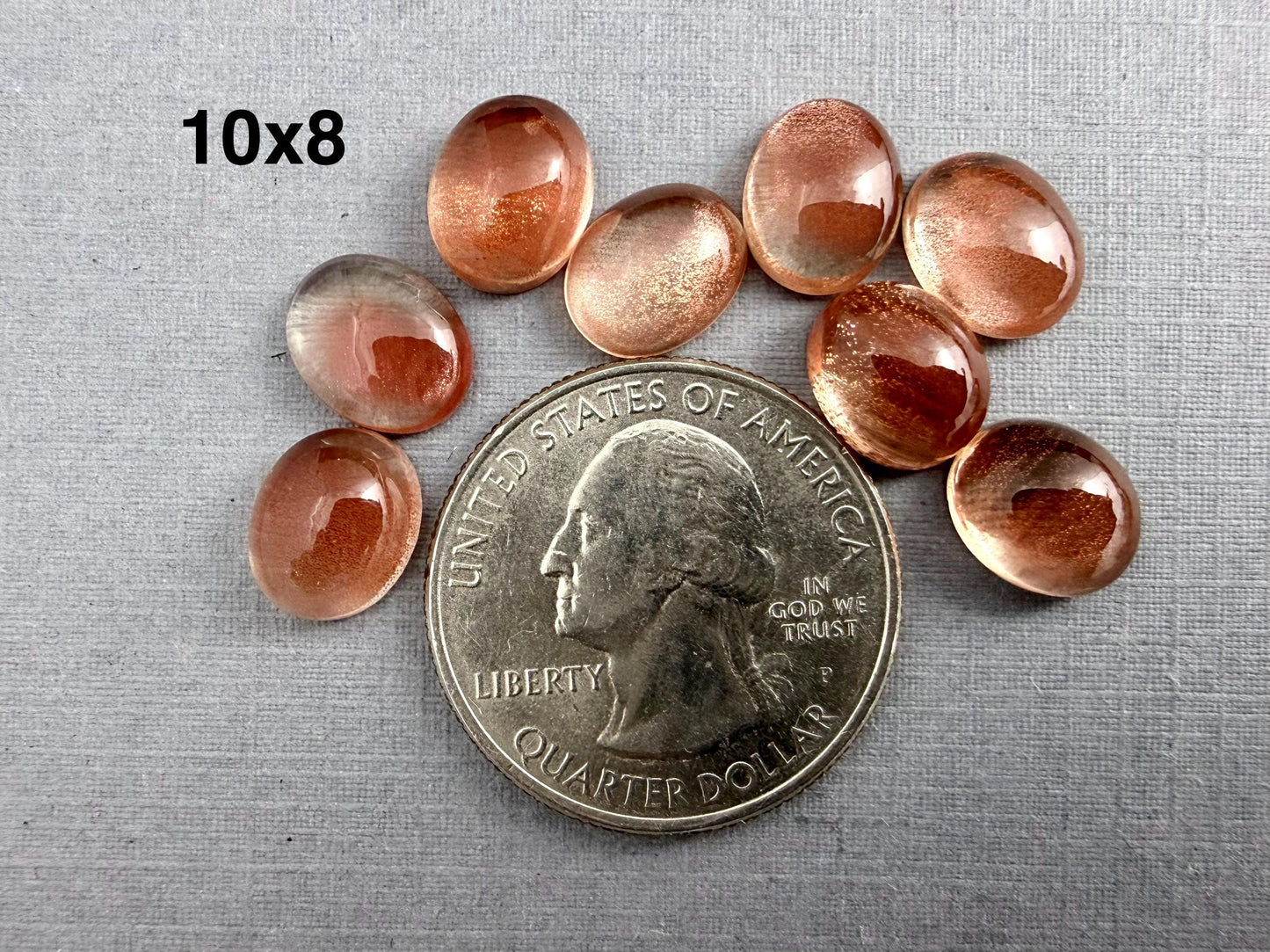 10x8 or 9x7 Oregon Sunstones Oval Cabochon with Schiller | Per Stone - Oregon Sunstone - GemEnthusiast