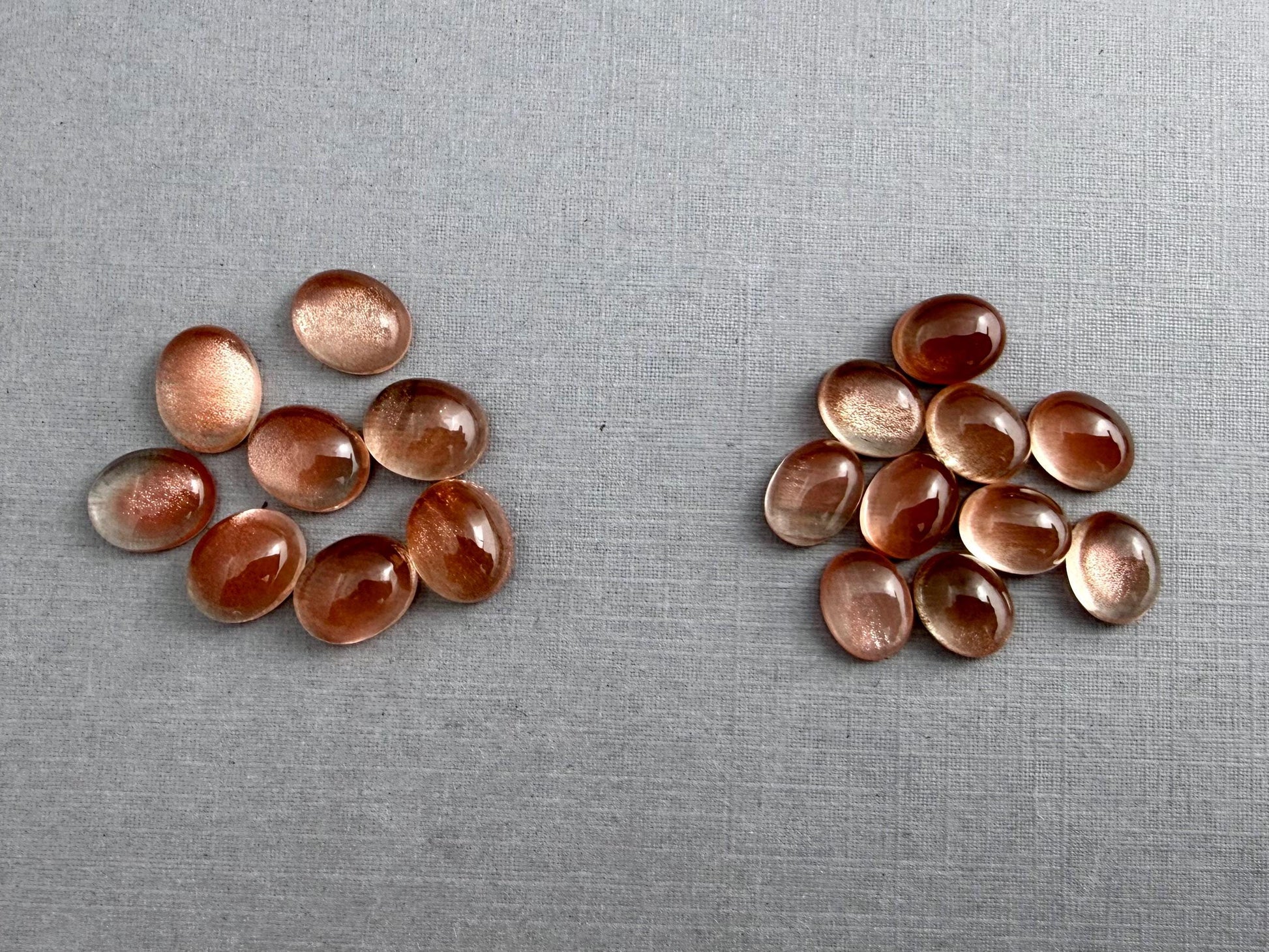 10x8 or 9x7 Oregon Sunstones Oval Cabochon with Schiller | Per Stone - Oregon Sunstone - GemEnthusiast