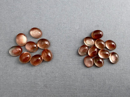 10x8 or 9x7 Oregon Sunstones Oval Cabochon with Schiller | Per Stone - Oregon Sunstone - GemEnthusiast