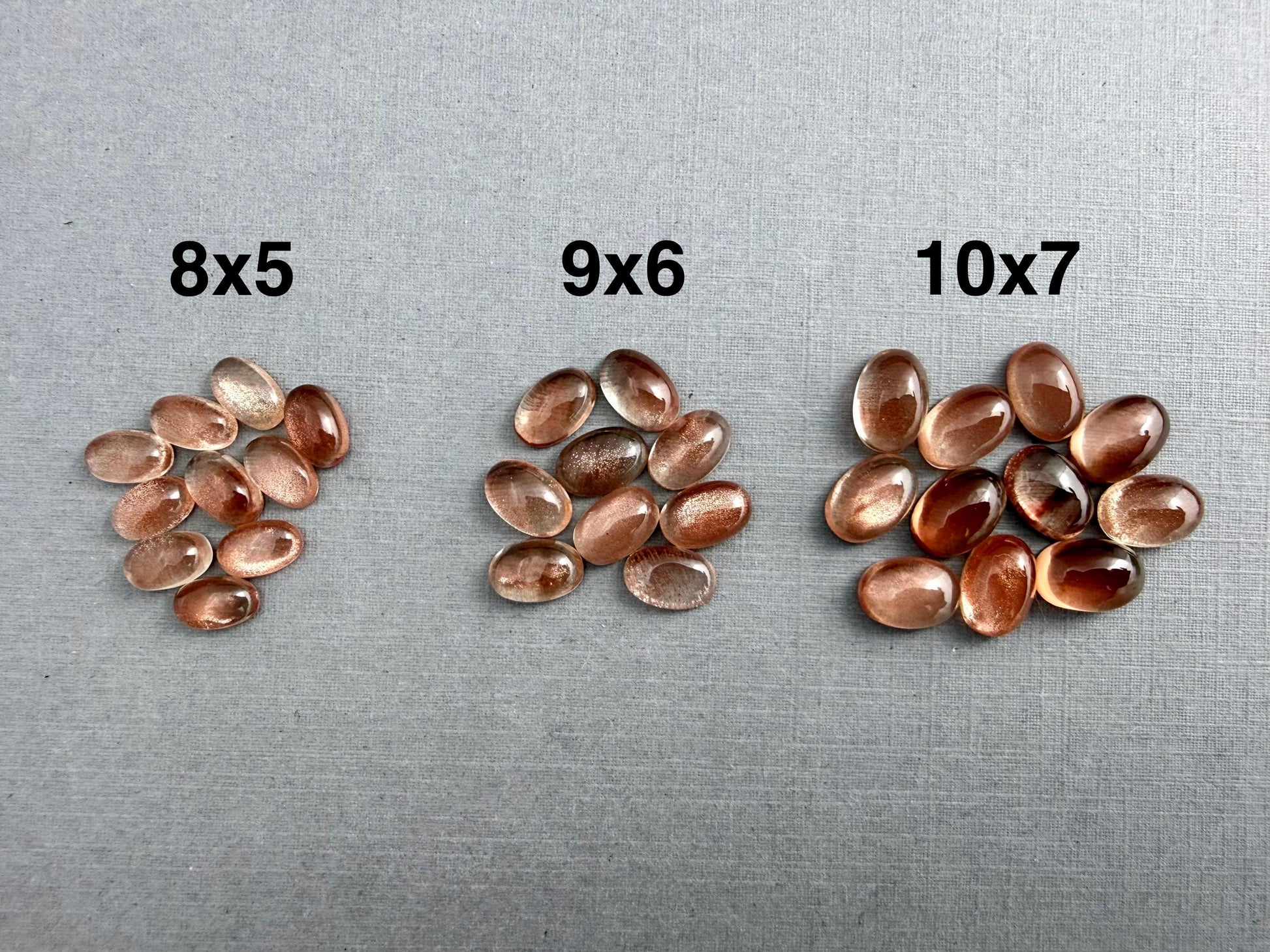 Oregon Sunstones | 10x7 9x6 8x5 | Oval Cabochon with Schiller | USA Gemstone - Oregon Sunstone - GemEnthusiast