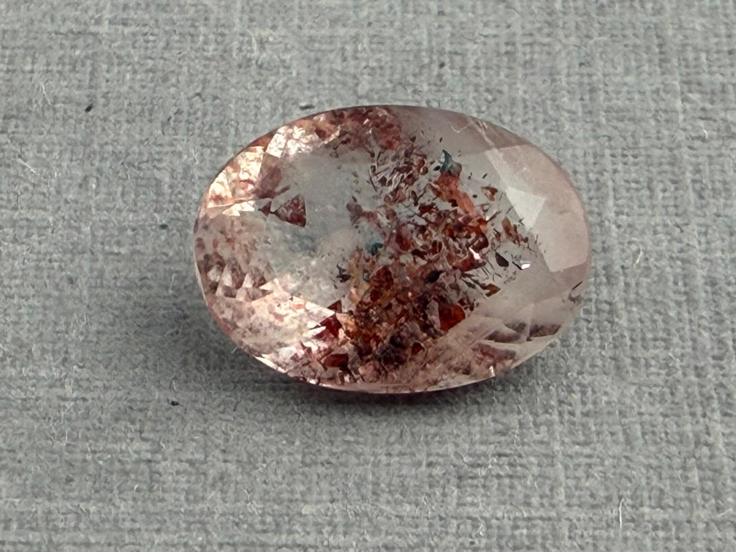 Fire Quartz with Hematite Flakes | 11x8mm | Oval Faceted Gemstone | QU533 - Fire Quartz - GemEnthusiast