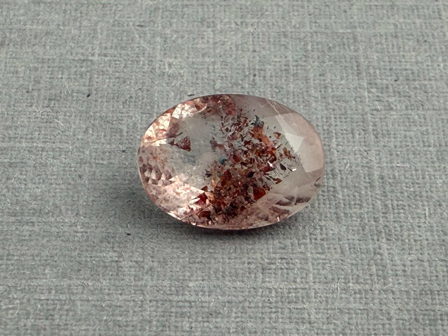 Fire Quartz with Hematite Flakes | 11x8mm | Oval Faceted Gemstone | QU533 - Fire Quartz - GemEnthusiast