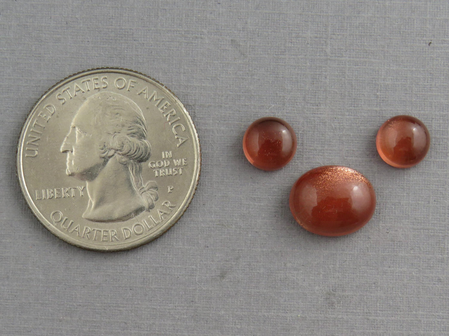 Oregon Sunstones Oval Cabochon Set | 7x7 pair and 11x9 single | 7+ carats | OSC332 - Oregon Sunstone - GemEnthusiast
